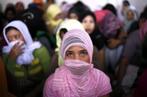 Giovane donna indonesiana emigra in Arabia Saudita, EPA / MAST IRHAM.