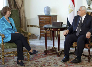 Egypt's interim President Adli Mansour speaks with EU Foreign Policy Chief Catherine Ashton, in Cairo