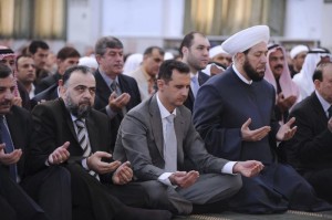 assad prega per la celebrazione dell' 'id al-Adha