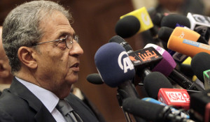 Amr Moussa, chairman of the committee to amend Egypt's constitution speaks at a news conference at the Shura Council in Cairo